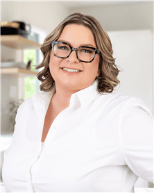 Corrine Hobbs, real-estate agent