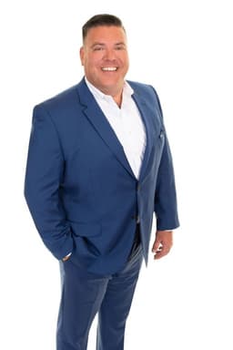 John Schuster, real-estate agent