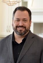 Michael Hunstad, real-estate agent