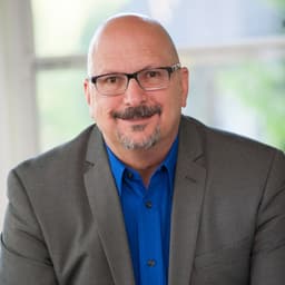 Tom Clusiau, real-estate agent